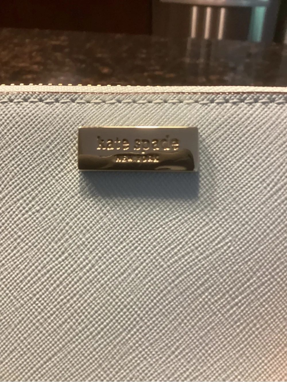 kate spade pale blue small flap wallet with gold plaque